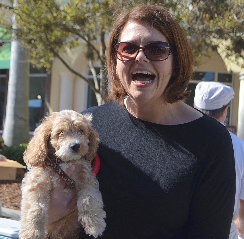 Lakewood Ranch' s Monaca Onstad brought her puppy, Finn.