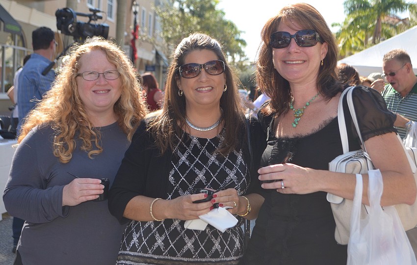 Bradenton' s Patsy Steffy, Parrish' s Lisa Emory and Bradenton' s Samantha Cummins sample different soups.