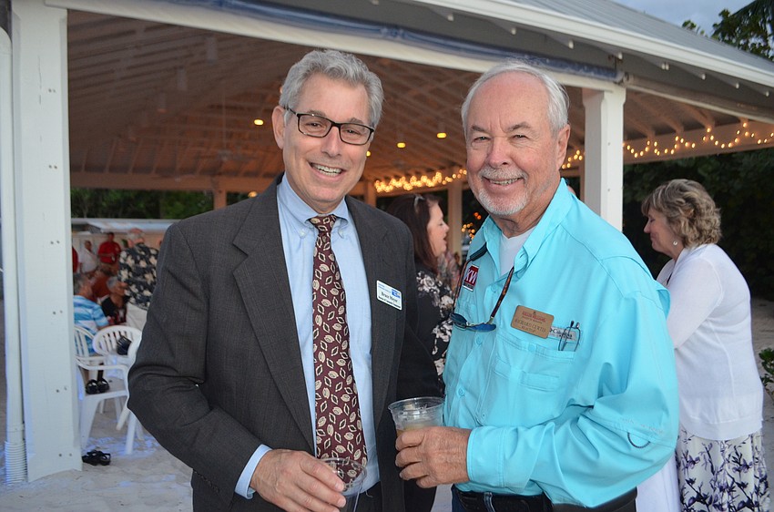 Bruce Meyer of United Way and Richard Curtis of Keller Williams Realty