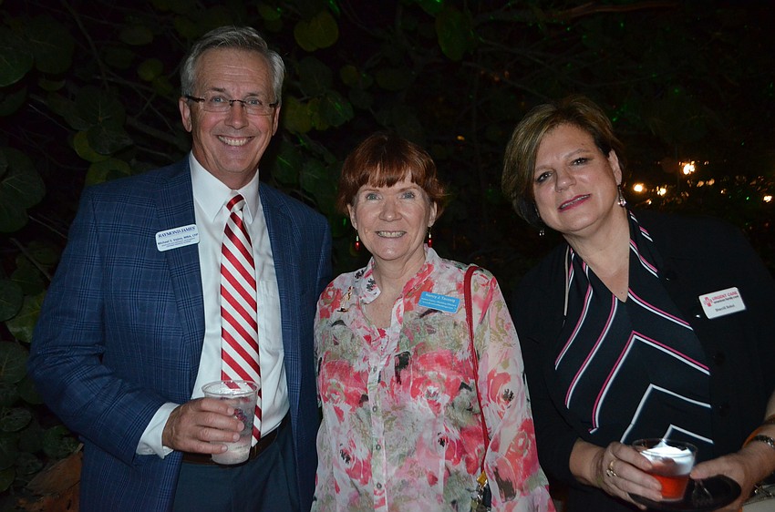 Michael Vejins of Raymond James, Nancy Taussig of Barefoot Weddings  and Sherrill Sokol of AFC Urgent Care