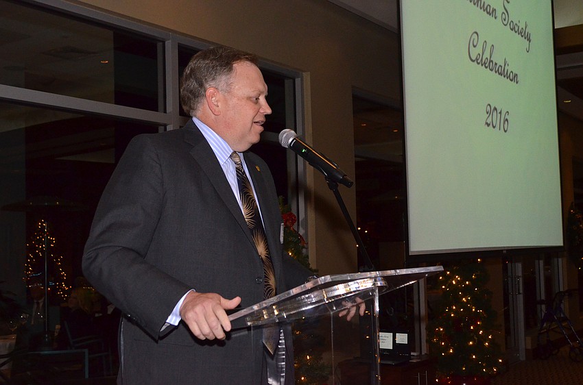 CEO of Sarasota Memorial Healthcare System David Verinder introduces the new president of the Sarasota Memorial Healthcare Foundation, Mason Ayers.