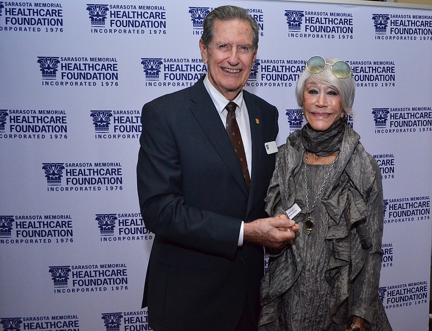 Chairman of the Sarasota Memorial Healthcare Foundation Board of Trustees Jim Syprett with Beverly Albertson, new Corinthian Society inductee