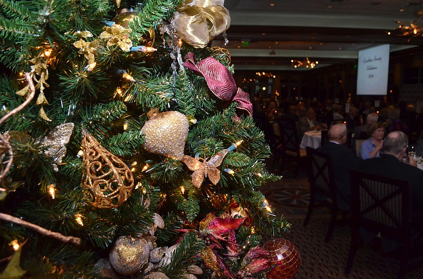 The banquet room at Sarasota Yacht Club was adorned with Christmas decorations for the Dec. 1 event.