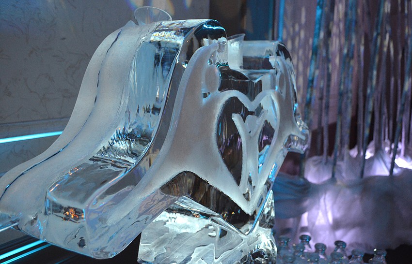 An ice sculpture in the shape of the Florida Center logo adorned one of the drink stations.