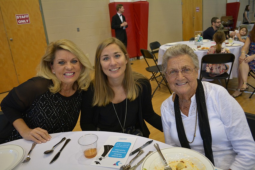 Peggy Kronus and Beth Oldiges, of Sarasota, represent Willis Smith Construction. Beth brought her grandmother, Dot Oldiges.