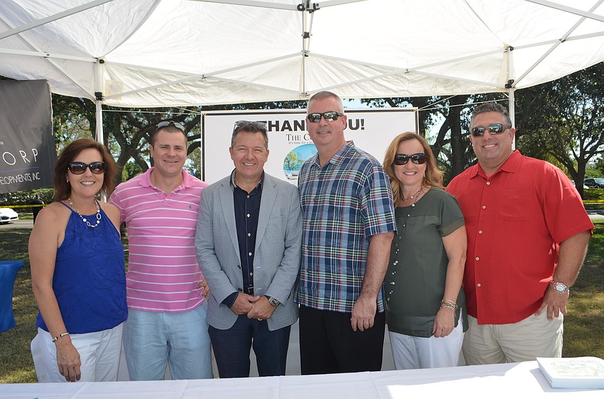 Lisa Lozano, Lawrence Mattern, Chuck Whittall, Dale Fitch, Karen Romig and Brett Mulligan of Unicorp National Developments Inc, the platinum sponsor for the event.