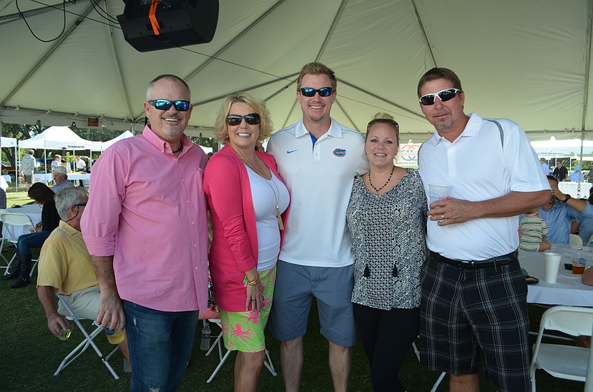 Phil and Tamatha Jones, Dr. Michael O’Neil and Aimee and Troy Galein of event sponsor, Longboat Key Dental