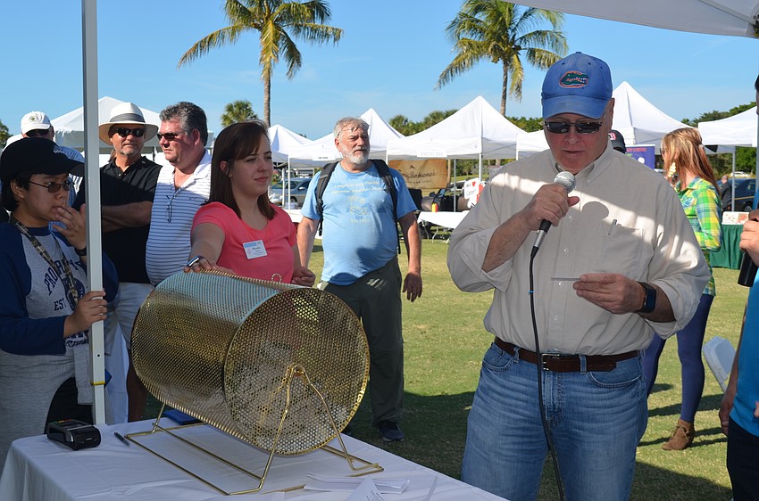 Kiwanis Club Foundation President Joe Walsh announces the winner of the Universal VIP Experience.