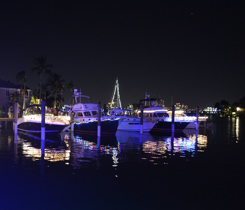 Each boat was decorated with Christmas lights for the occasion.