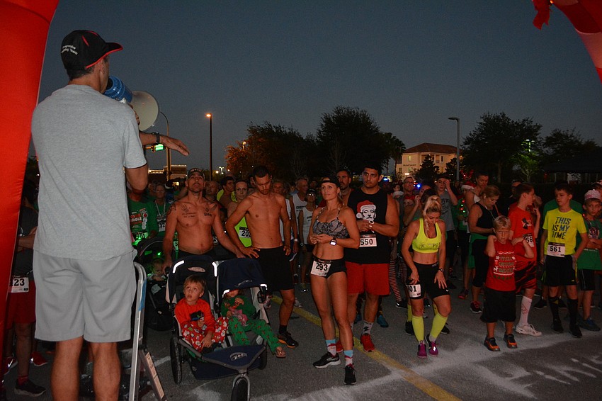 Runners get final instructions for the Jingle Bell Run.