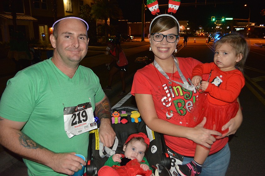 Mark Hoffman and his wife, Lindsay, completed the race with sleepy Brooklyn, 4 months, and Charlotte, 18 months.