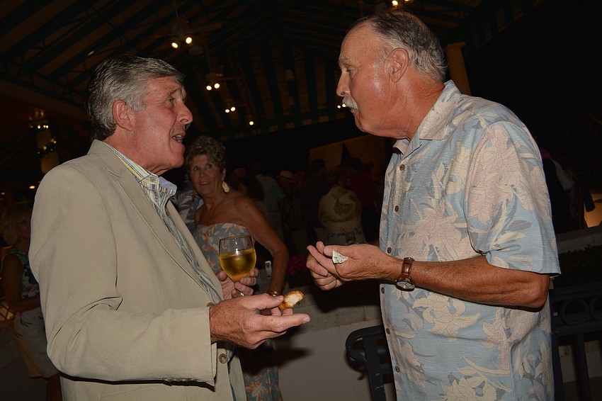 Eric Walsh chats with Jim Neale.