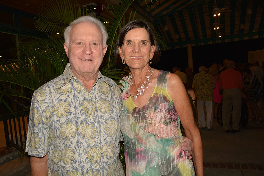 Dennis Trescott joined his wife, Joanna, the club'  s photographer for the evening.