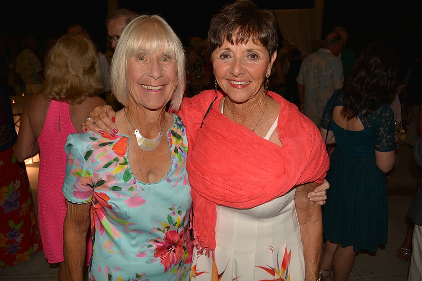 Peggy Lowdnes, publicity chairwoman, meets up with club president Maria VanBrunt.