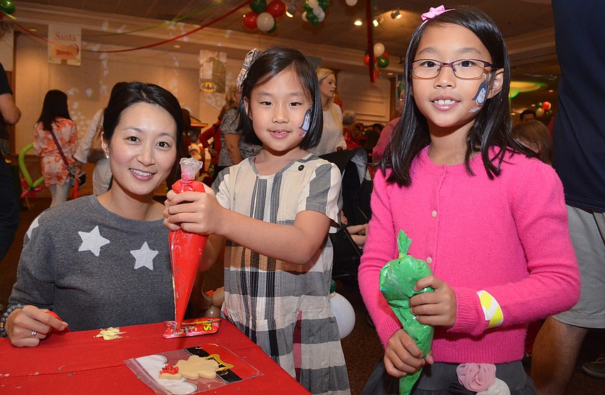Janna Kim with her daughters, Allison Kim, 7, and Anna Kim, 9