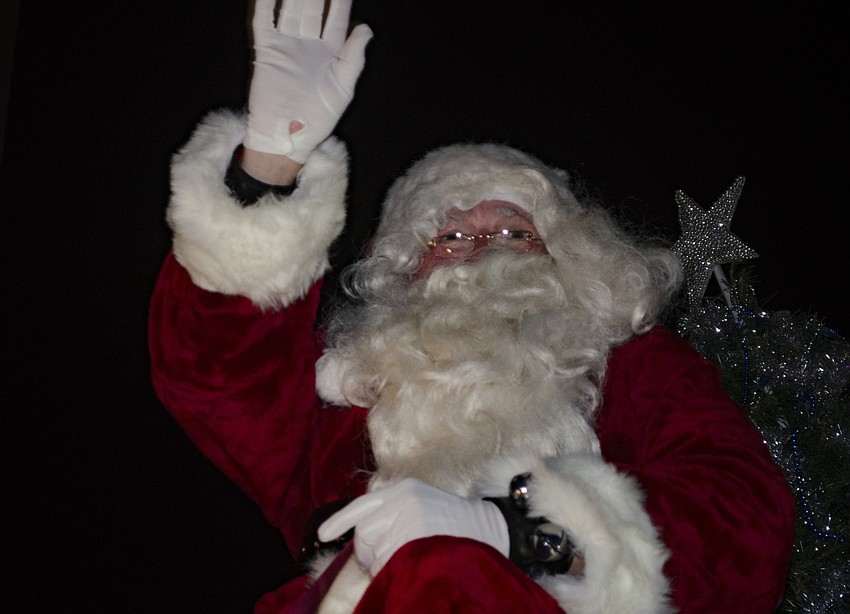 Santa brought up the end of the Downtown Holiday Parade.