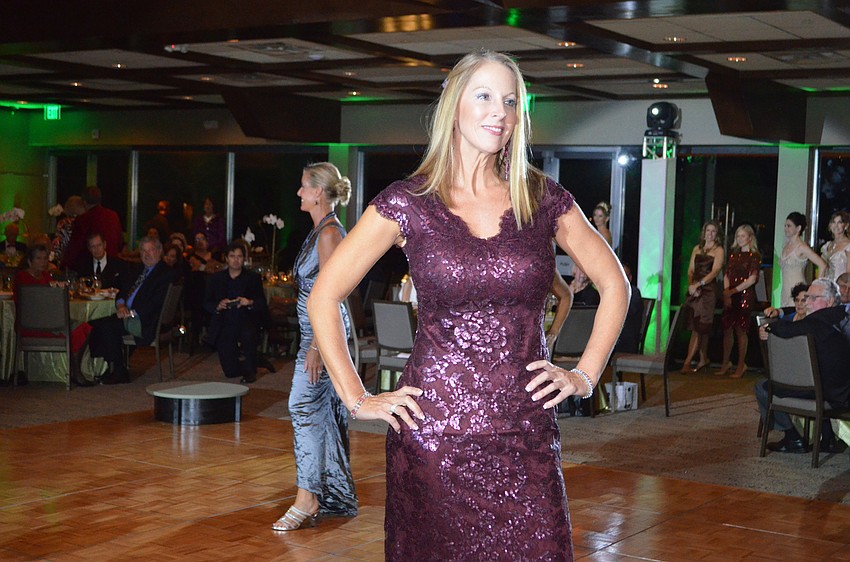 Heather Clark models a gown from Designing Women Boutique.