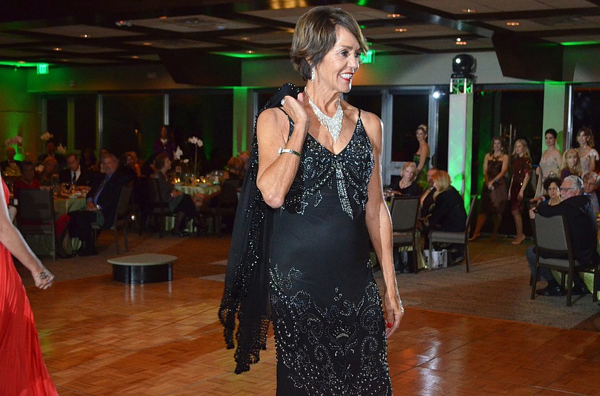 Jane Krombeen models a gown from Designing Women Boutique.