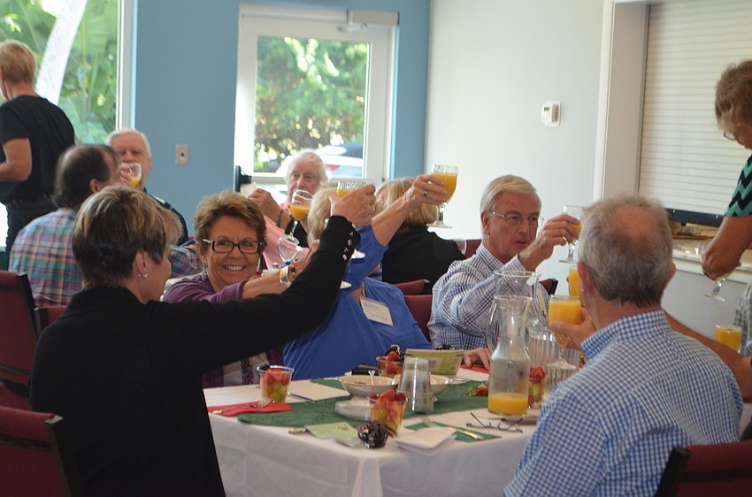 Attendees toasted to food, friends and family.