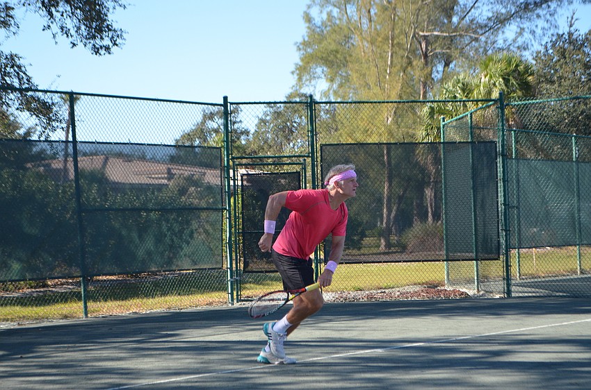 Erik-Jan Walson competes in the men’s 55 doubles finals.
