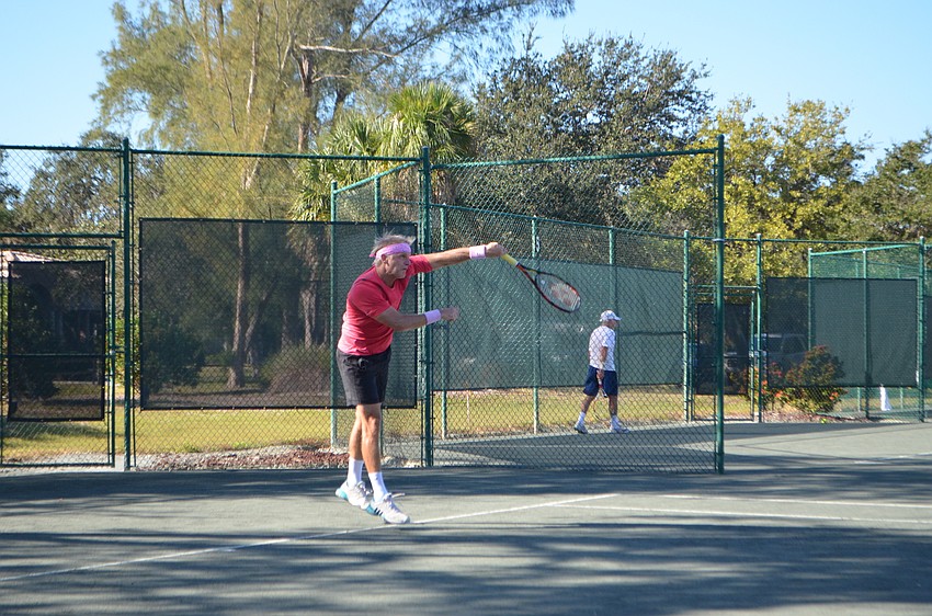 Erik-Jan Walson competes in the men’s 55 doubles finals.