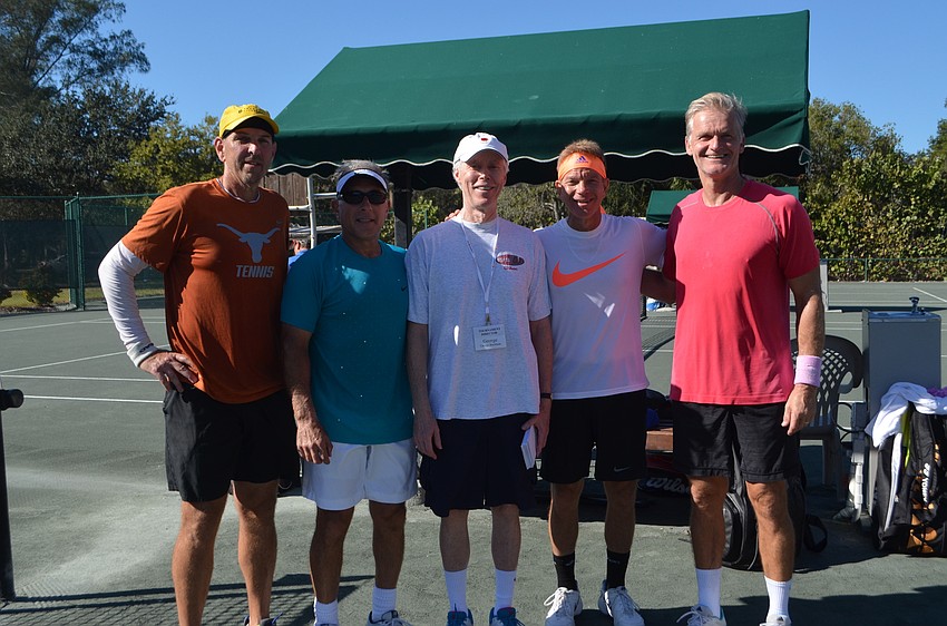 Men’s 55 doubles winners Alex Klitch and Tim Pier with tournament director George Bachman, Eric Friedman and Erik-Jan Walson