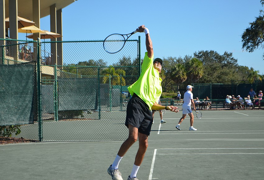 Your Observer Photo Larry Turville takes a swing during the men’s