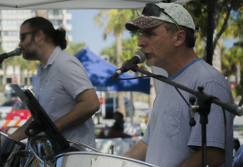 Rick Andre and Cort Faris of the Sarasota Steel Pan Band perform during the Siesta Beach Seafood and Music Festival.