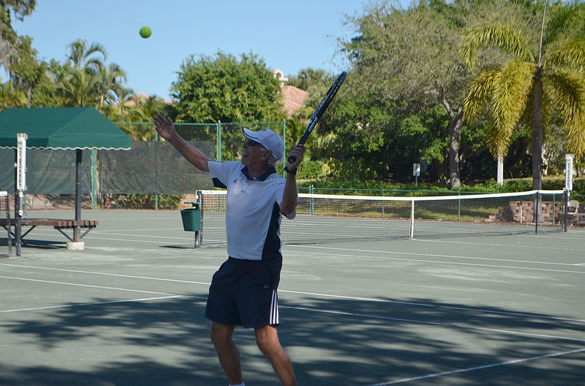 Joseph Bachmann serves during the men’s 75 singles final match.