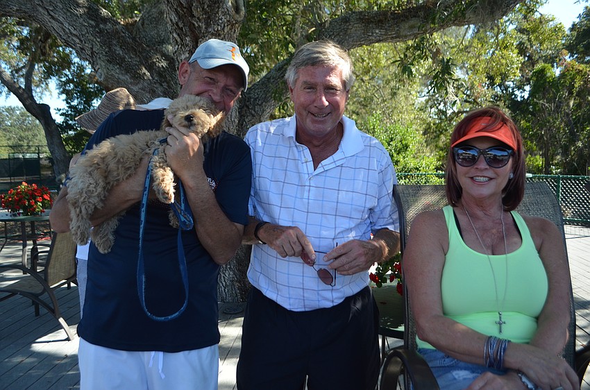 Mark Schlobach and Polo with Andy Sawyer and Bonnie Geyman