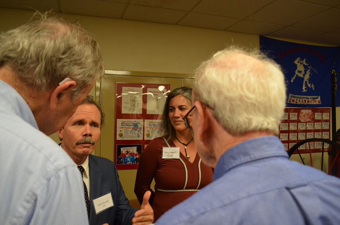 Florida Department of Environmental Protection engineer Bob Brantly speaks to Siesta Key residents at a workshop Nov. 30.