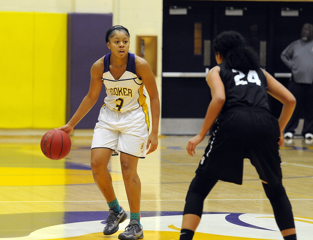 Senior Cellexia Foster and the Booker girls basketball team held Sebring to 11 points. File photo.