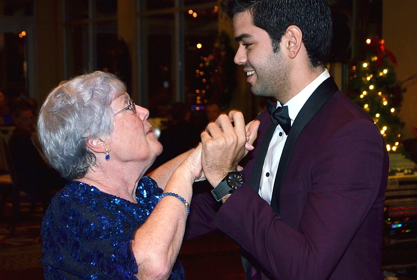 Virginia Tashian dances with Edward Gonzalez.