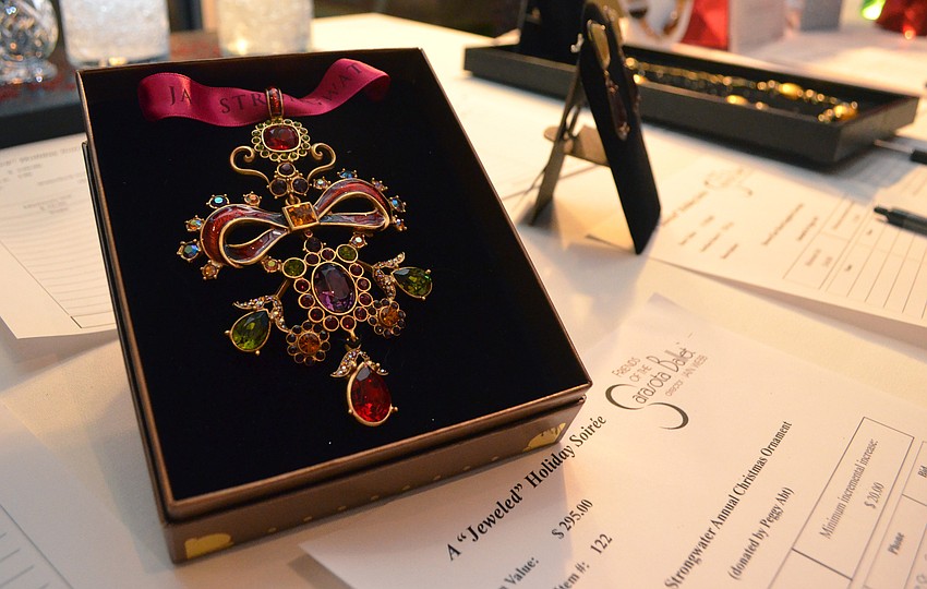 A Jay Strongwater Christmas ornament — donated by Peggy Abt — was available through the auction with a minimum bid of $100.