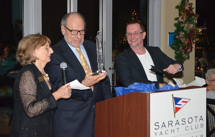 Friends of the Sarasota Ballet President Janice Kunkel, Honorary Chairman and Sarasota Ballet Executive Director Joe Volpe and Director Iain Webb admire Volpe’s award.