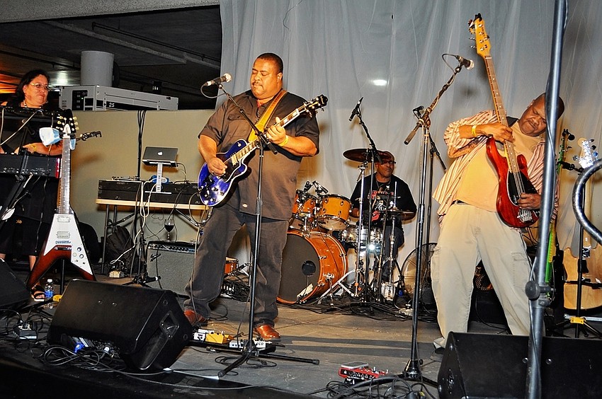 Larry MCCray Band performs with Clever Keys on keyboard, Larry singing lead, Steve on drums and Aerie on bass.