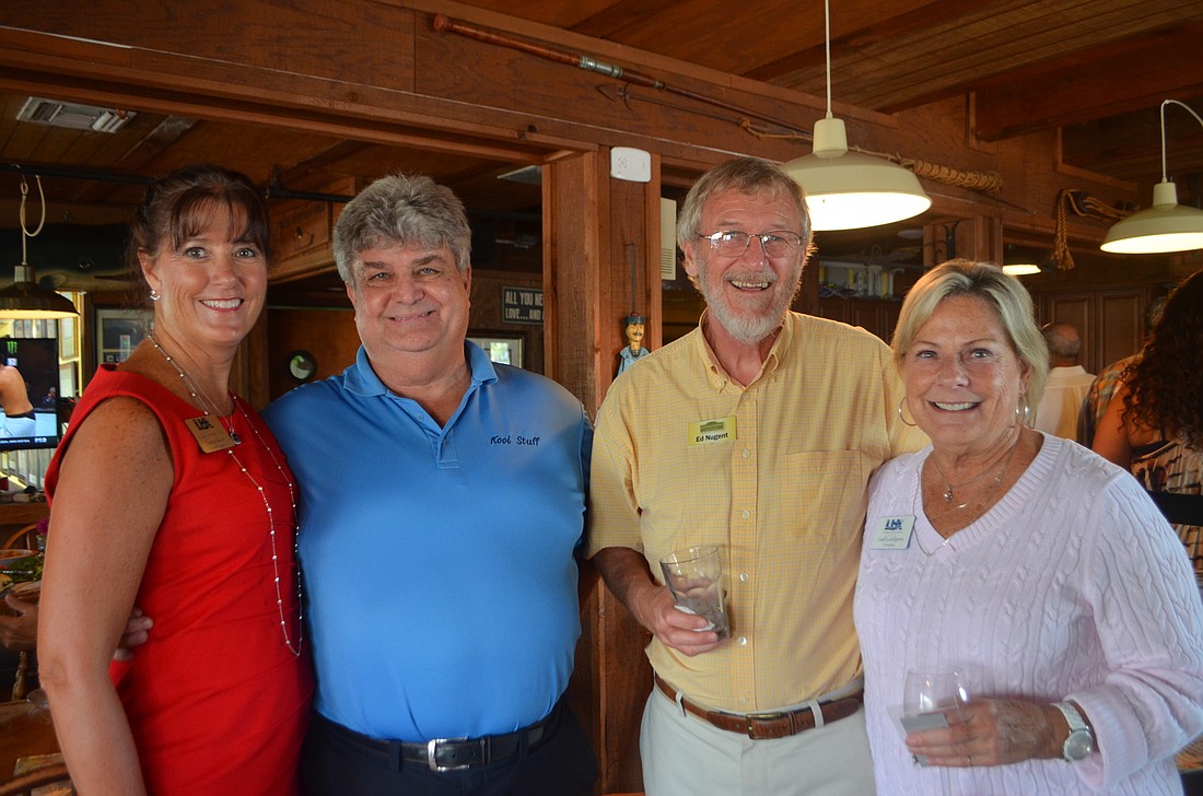 Tammy Halstead, Tom Scholz, Ed Nugent and Chamber President Gail Loefgren at August's Business After Hours.