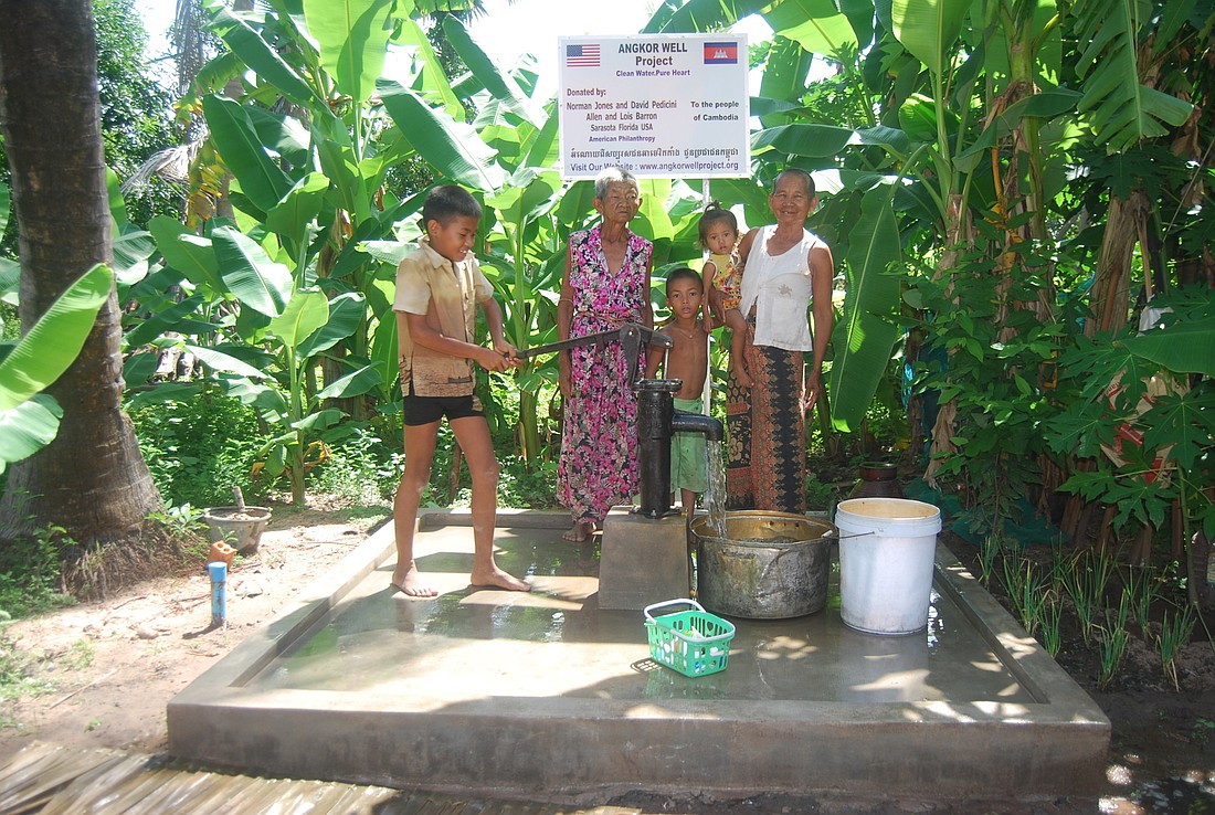 A family uses the well Jones, Pedicini and the Barrons sponsored. Photo courtesy of Allen Barron.