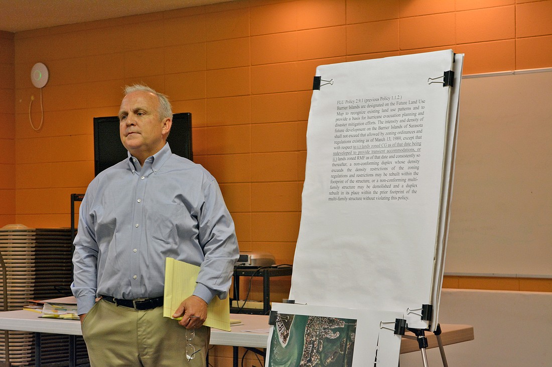 Planning consultant Bo Medred addresses attendees during a public meeting at St. Boniface Episcopal Church Wednesday.