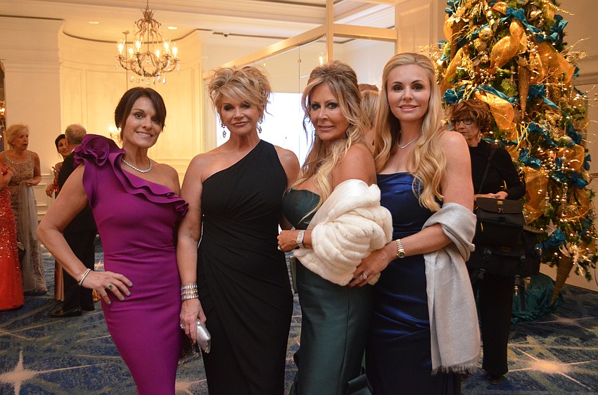 Event committee members Mimi Carlin, Gay Daniel, Mary Gratehouse and Melissa Howard