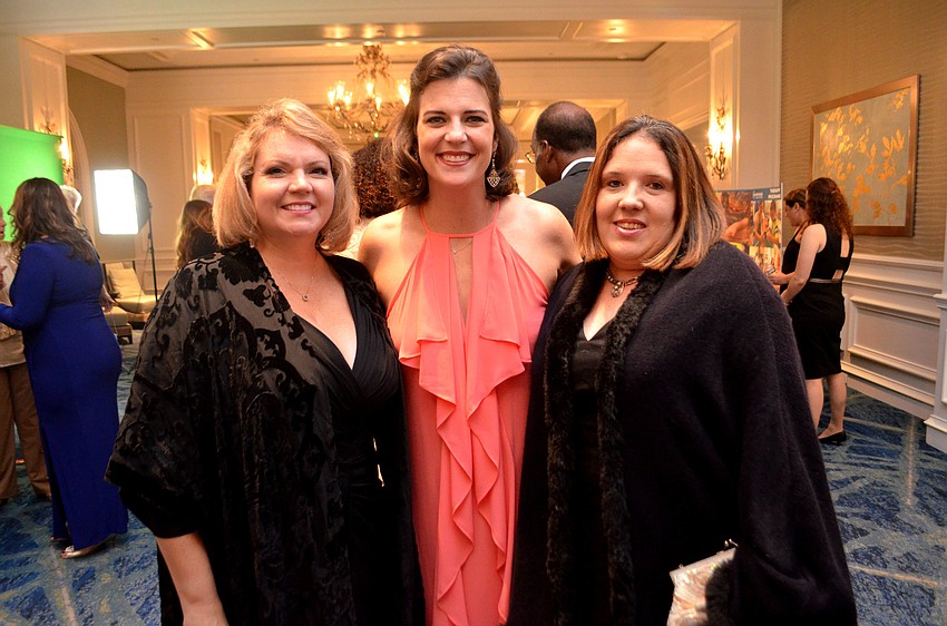 Veronica Brandon Miller, event committee member Kameron Hodgens and Jennifer Fretz Smith