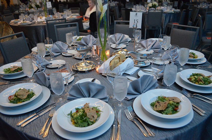 Tables were set with salads for guests following the cocktail hour.