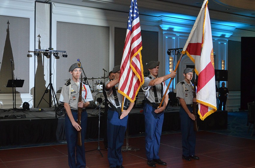 The Sarasota Military Academy Color Guard led attendees in the Pledge of Allegiance.