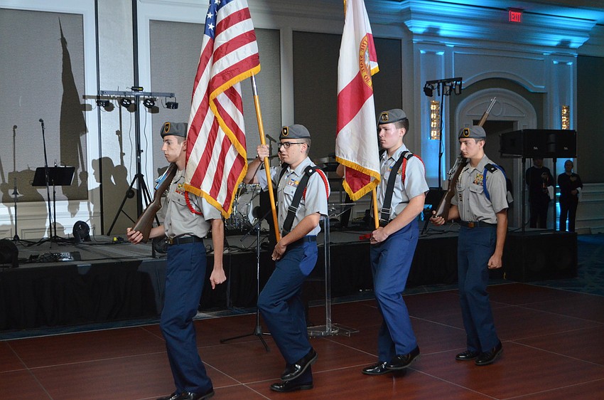 The Sarasota Military Academy Color Guard led attendees in the Pledge of Allegiance.