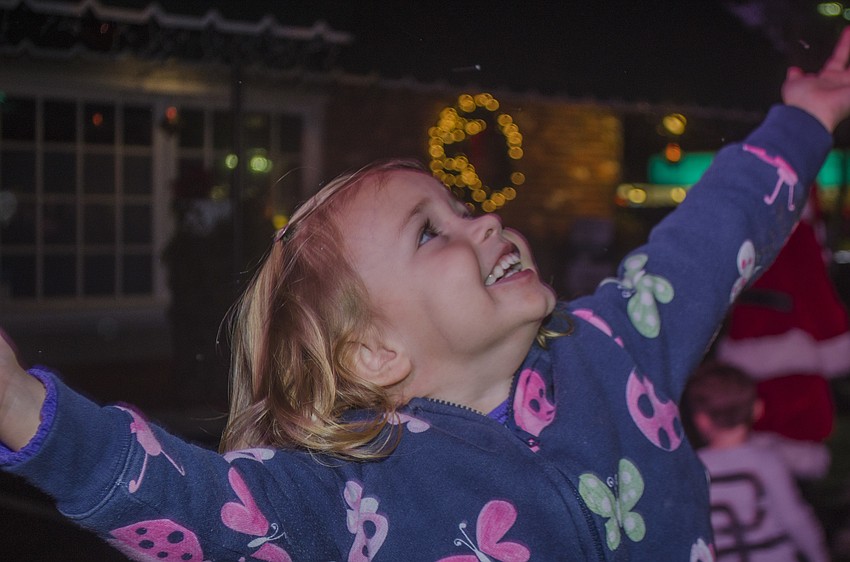 Cecelia Hankey plays in the fake snow.