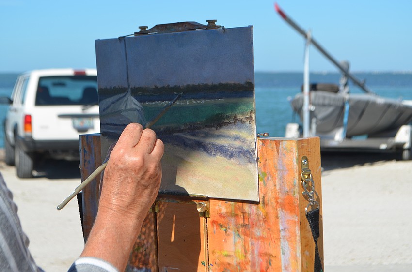 Tish Stanhope moves her paint brush gently across her canvas.