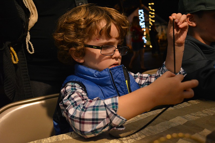 Three-year-old Michael Smith, of Greenbrook, focuses on his craft.