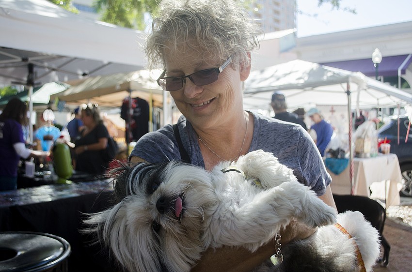Ann Angell holds Voltaire.