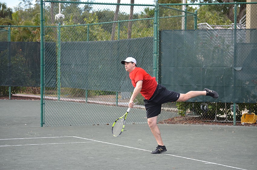Brad Cohen serves during a preliminary match on Dec. 9.