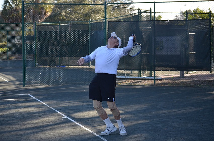 Rich Belford eyes the ball during a final match on Dec. 11.